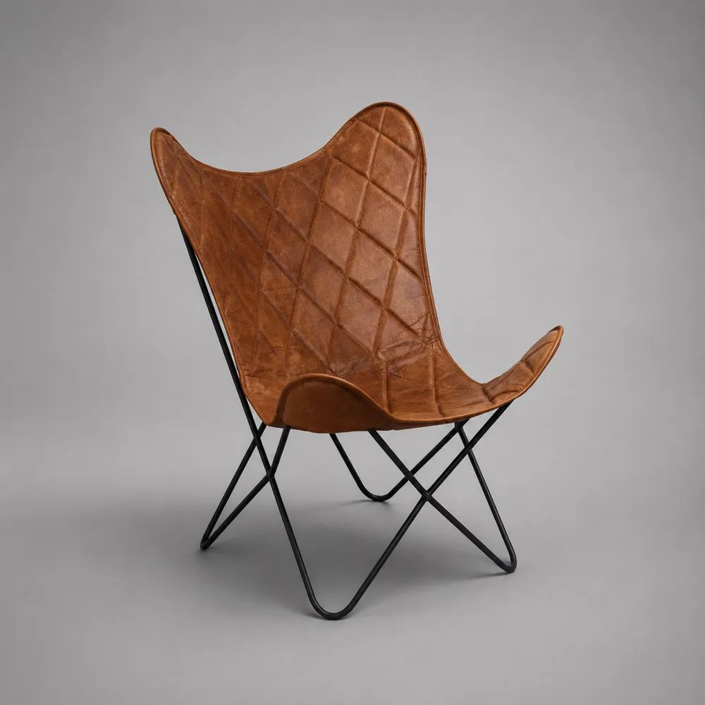 Poltrona butterfly in pelle sintetica trapuntata cognac con telaio in acciaio nero, 74 × 71 × 90 cm